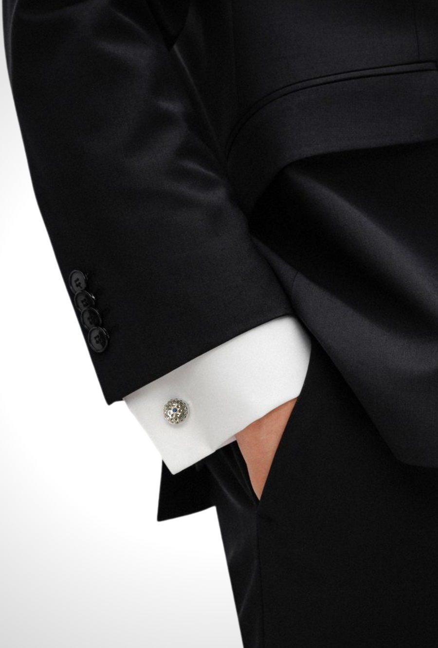 Silver cufflink with Sapphire shown on cuff